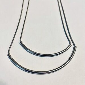 Double strand silver curved necklace